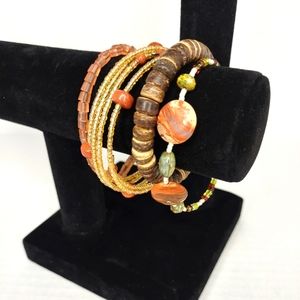 Stack of natural toned bracelet and choker set